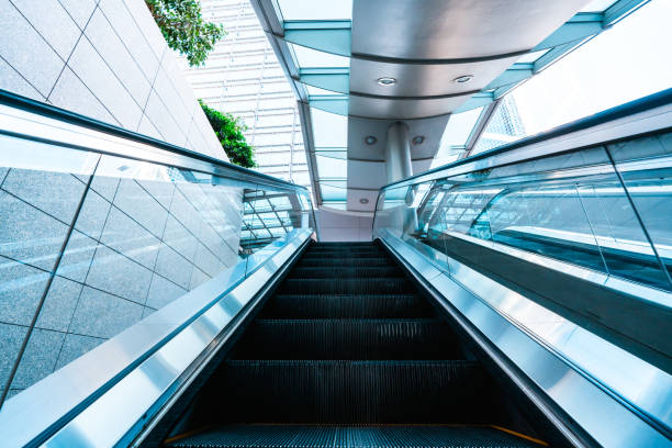istock Escalator and modern office buildings in downtown 1296514404