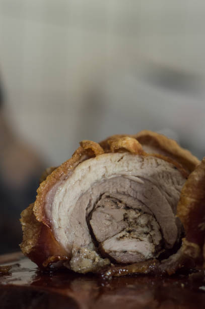 istock sliced ​​porchetta background 1296515561