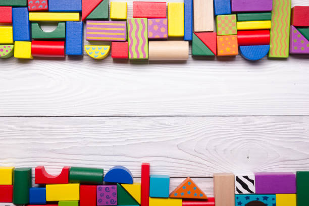 istock Kids educational developing toys frame on white background. Top view. Flat lay. Copy space for text 1296515912