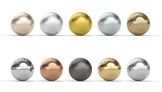 different metallic spheres, gold, copper, steel, iron, bronze. 3d render. nobody around.