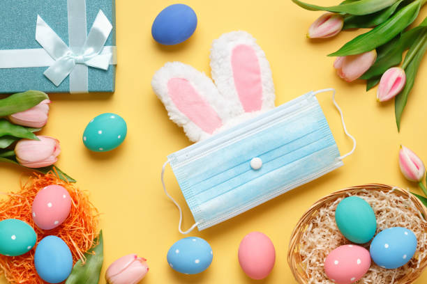 istock Happy easter. Flat lay greeting card against yellow background. 1296518380
