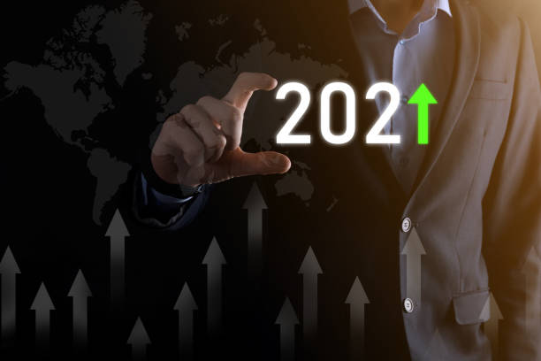 istock Business development to success and growing growth year 2021 concept.Plan business growth graph in year 2021 concept.Businessman plan and increase of positive indicators in his business 1296518769
