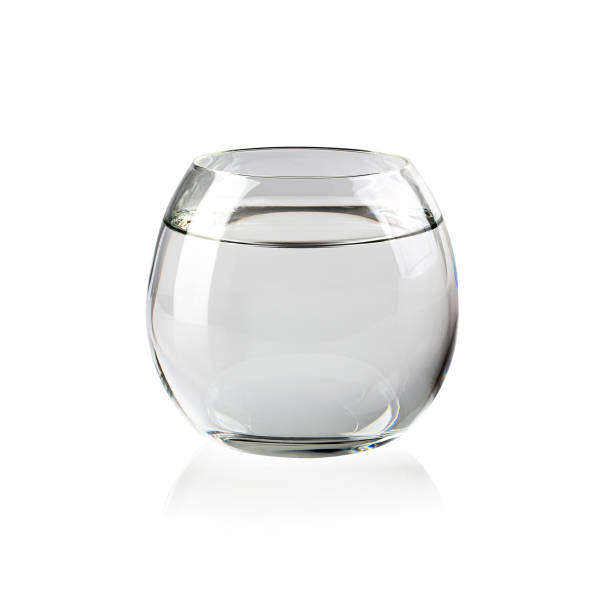 istock Realistic Transparent water in Glass isolated on white background. 1296519451