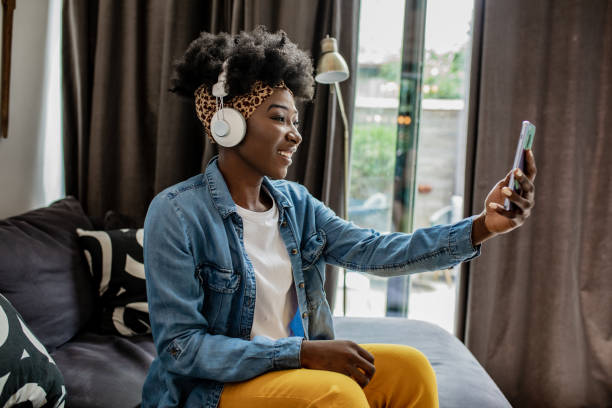 istock A young African-American woman communicates via video call 1296521068