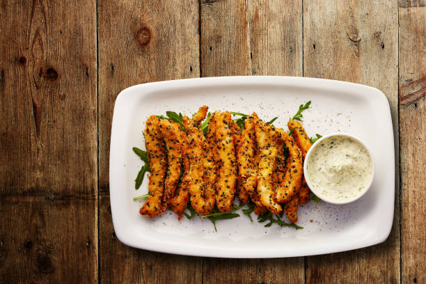 sesame cod goujons with tartare sauce - tartar sauce imagens e fotografias de stock