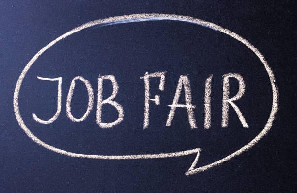 text job fair written in white chalk on a black surface. the concept of job search text job fair written in white chalk on a black surface. the concept of job search. invitation to an interview job fair photos stock pictures, royalty-free photos & images