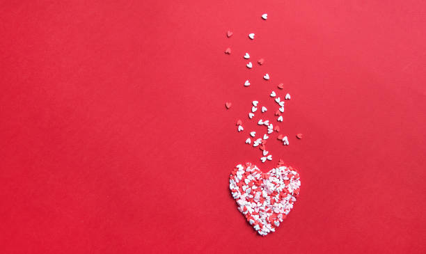 istock Pink Background with Valentine's Hearts. Abstract Wallpaper 1296530097