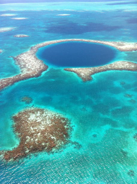 belize by air - lighthouse reef stock-fotos und bilder