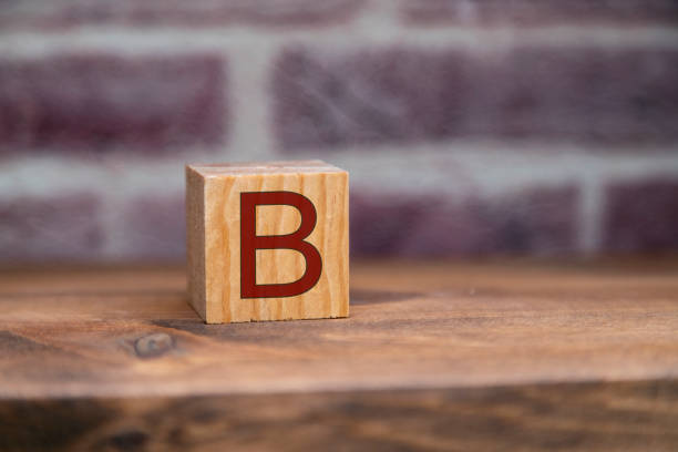 letter b written on cube wooden blocks. - beginnings letter b planning letter a imagens e fotografias de stock