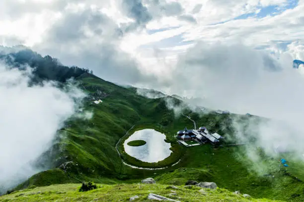 Prashar Lake lies 49 km north of Mandi, Himachal Pradesh, India, with a three storied pagoda-like temple dedicated to the sage Prashar.