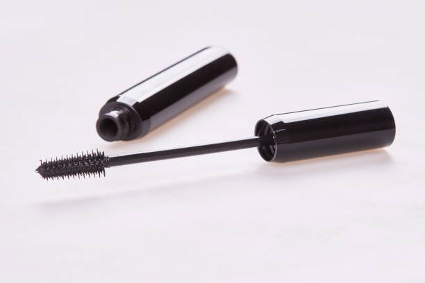 istock Mascara Bottle with Brush Isolated 1296533998