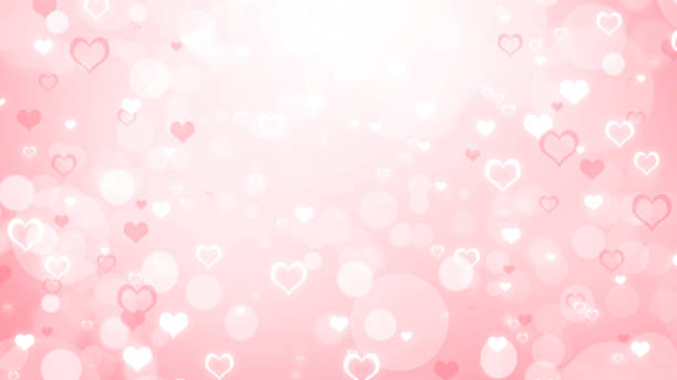 istock Soft blurred pink and white background with hearts and circles. Valentines day bokeh background 1296535200