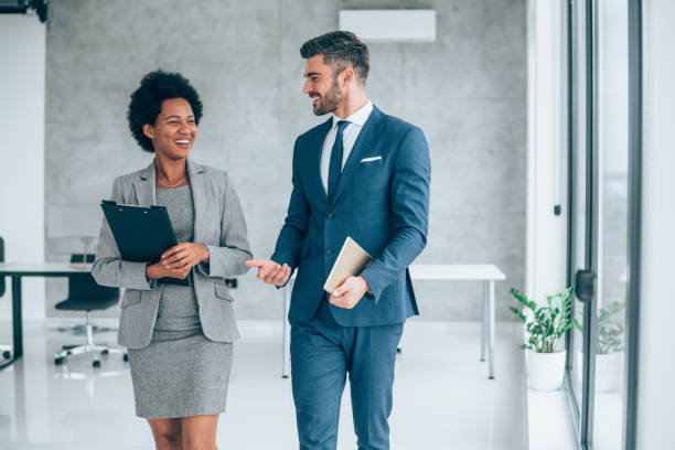 business conversation in the office. - interview meeting business women imagens e fotografias de stock