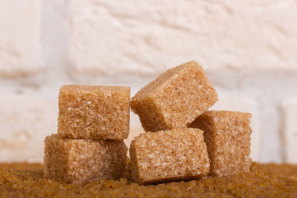 istock Sugar in the form of sand and cubes 1296542259