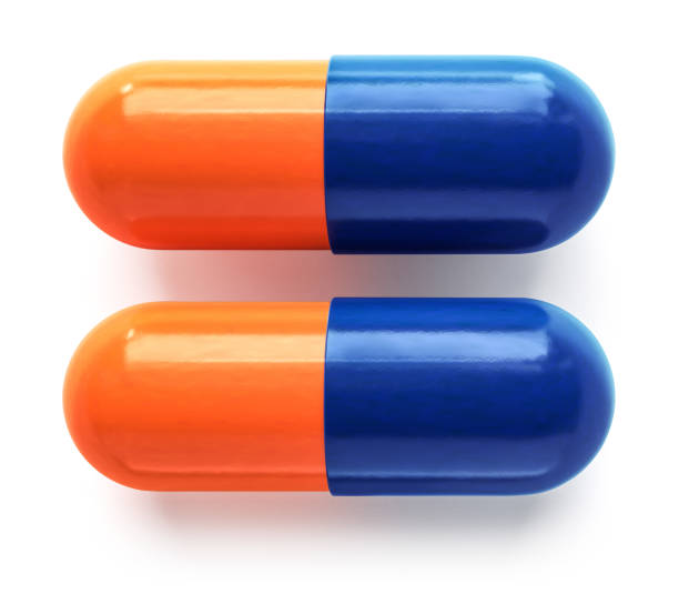 istock Pills on a isolatie whiteboards background 1296544404