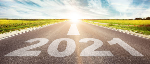 istock Happy New Year Background. Road to 2021. 1296549783