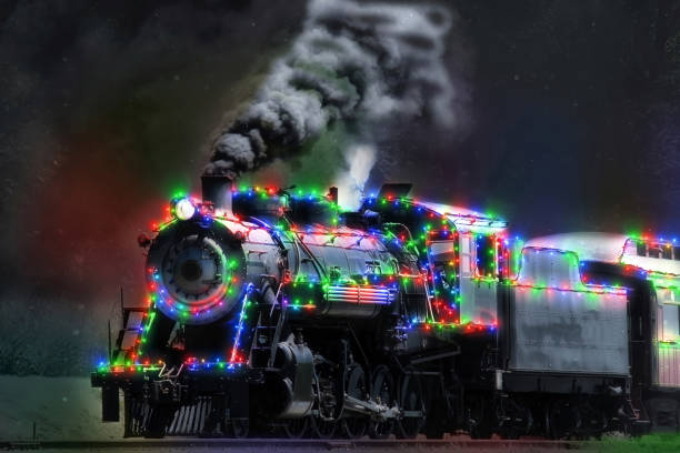 istock A Restored Steam Engine With Christmas Lights on it in a Snow Storm 1296550266