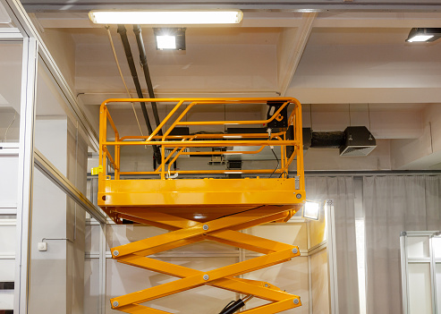 Elevated Work Platform Scissor Lift Inside Building