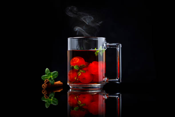istock Cup of hot cherry, cinnamon and peppermint tea 1296557453