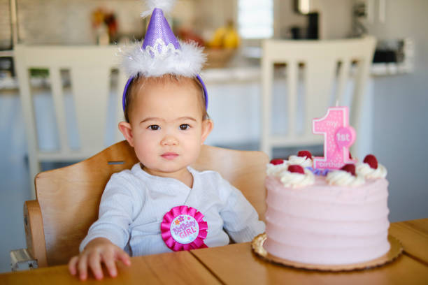 istock Japanese American Baby Celebrating First Birthday 1296560331