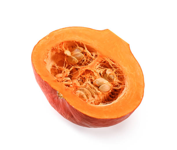 istock half  fresh pumpkin with pulp and seeds close-up isolated on white background 1296560624