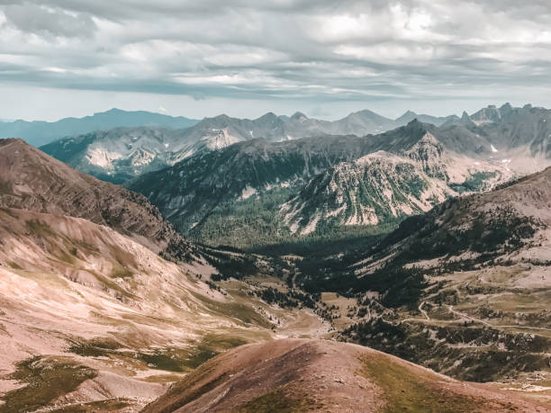 istock Mountain landscape, mountain hills and ridges under overcast skies 1296565084