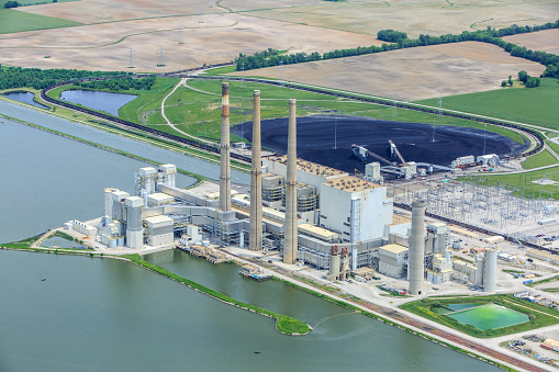 Aerial Photo of Coal-Fired Power Plant and cooling pond.