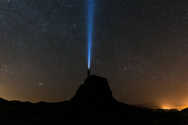 istock light beam in the starry night sky at Trona Pinnacles, California 1296568881