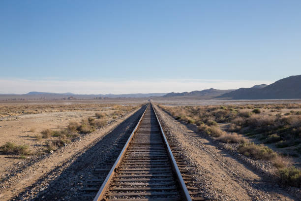istock Railroad in Trona Pinnacles, California on sunny day 1296568883