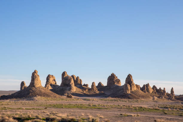 istock tufa formations in sunshine at Trona Pinnacles, California 1296568891