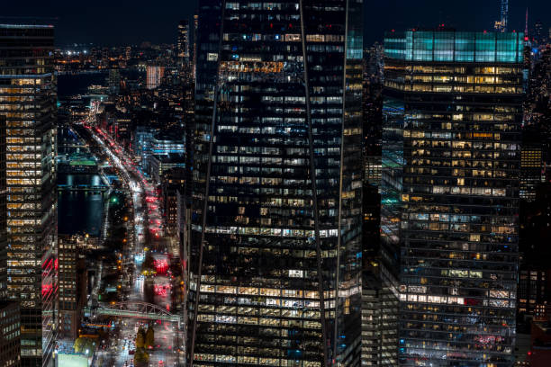 istock New York City office buildings by night 1296574018