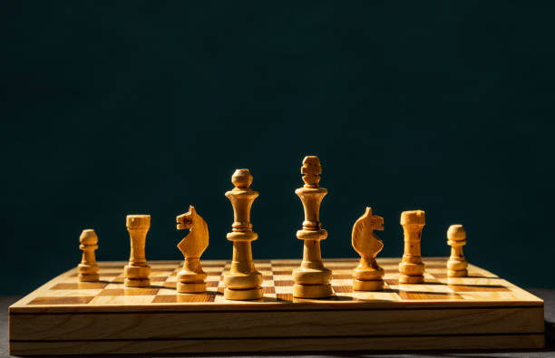 istock handmade wooden chess pieces 1296575271
