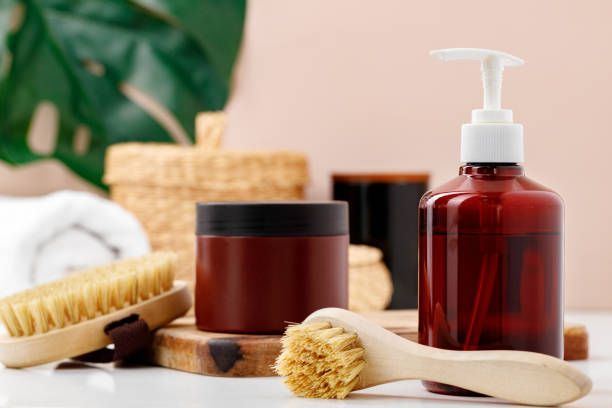 istock Brown skincare containers in bathroom close up 1296575511