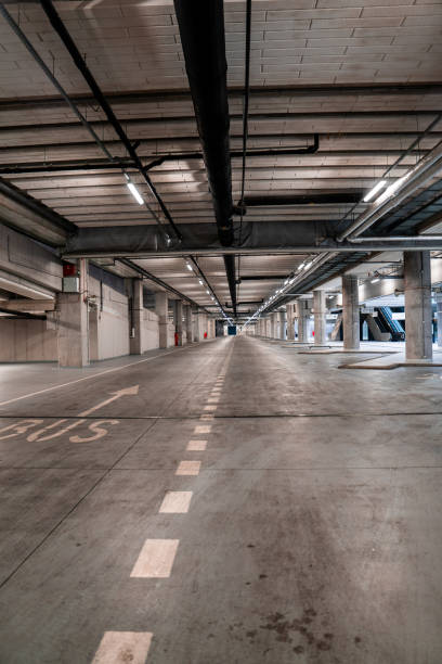 istock Interior of an underground bus parking with no vehicles. 1296575791