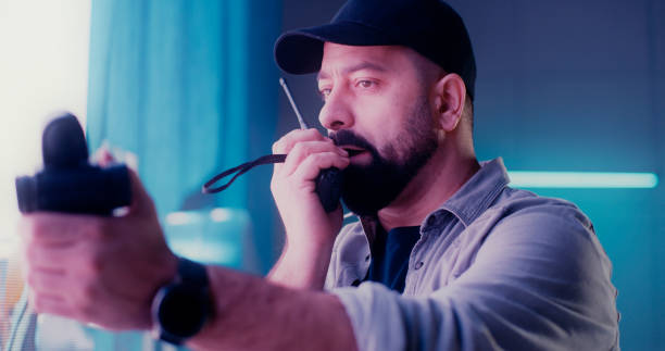 istock Male technician searching for defects in LED screen 1296583418