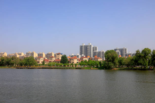 istock Waterfront city building scenery, China 1296587074