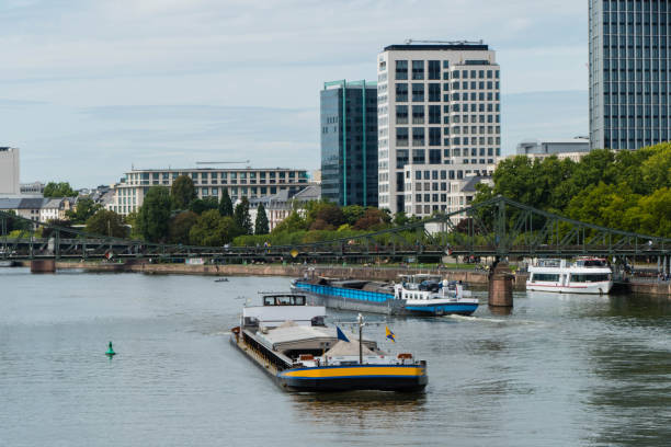 istock Freight Ship on River Main Frankfurt Germany 1296596560