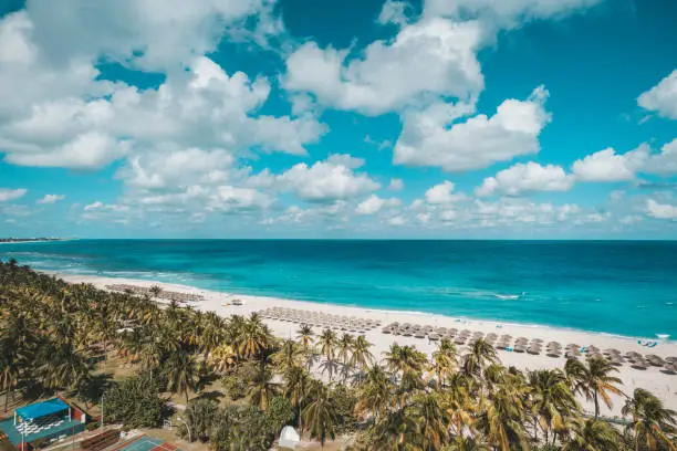 Top view of the resort town of Varadero. Cuba. Long beach is 20 km away with sun loungers and thatched umbrellas and lots of palm trees.