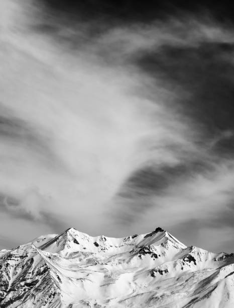 In Western Colorado Black and White Bookcliff Mountain Range Contrasting Nature Scene  on a Gloomy Cloudy Wintry Day (Shot with Canon 5DS 50.6mp photos professionally retouched - Lightroom / Photoshop - original size 5792 x 8688 downsampled as needed for clarity and select focus used for dramatic effect)