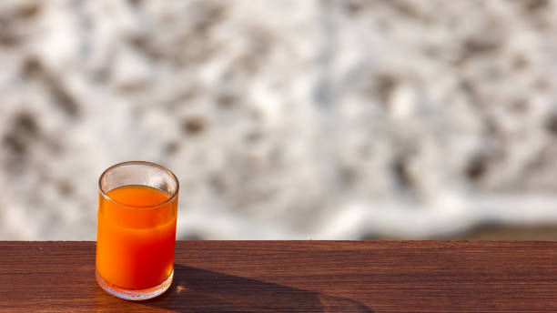 istock Orange juice and sea waves 1296604889