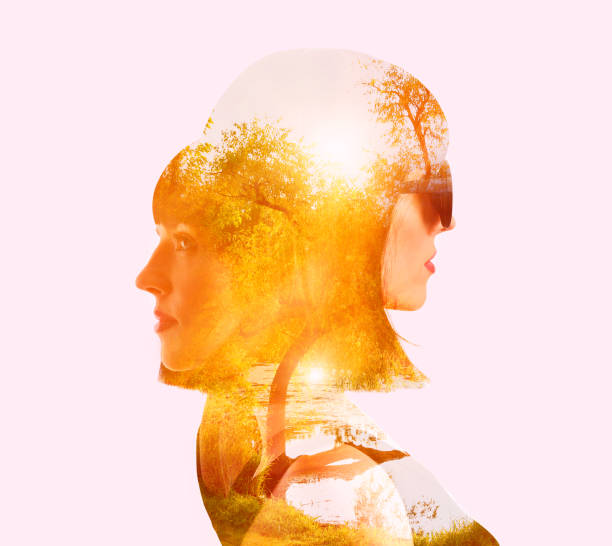 istock Multiple exposure of woman with two faces 1296608513