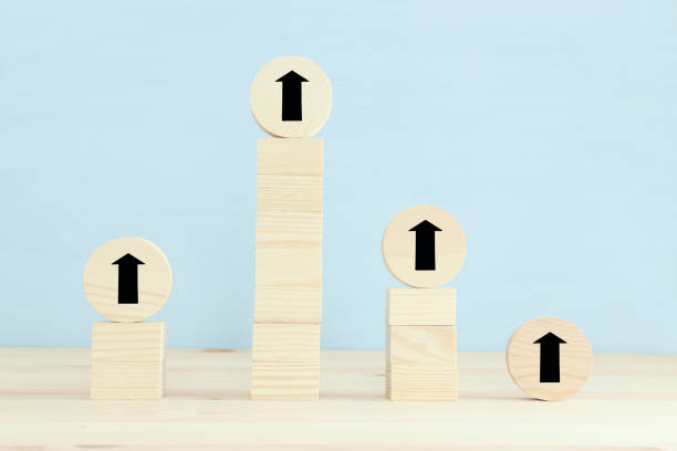 istock concept of growth success process. hand picking cube with arrow symbol 1296608859