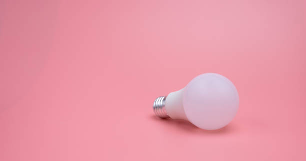 istock A light bulb in the pink background , New idea concept 1296616165