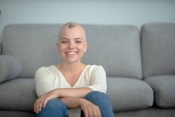istock Happy and beautiful cancer survivor 1296627873