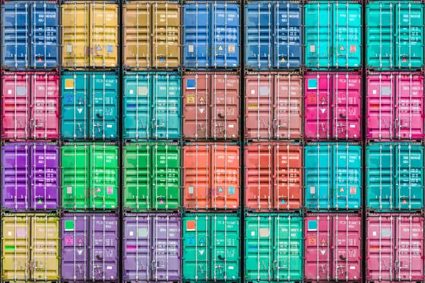 Photo of colorful containers stack, the terminal in an industrial seaport, texture background