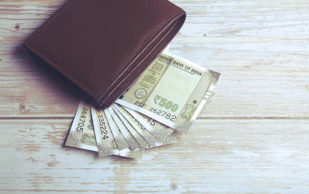 istock Five hundred rupee Indian banknotes in leather wallet 1296633137