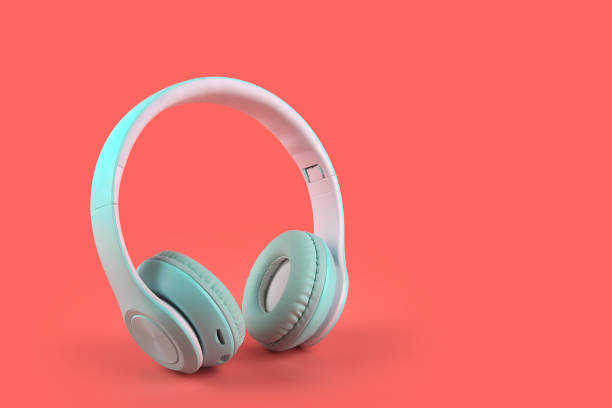 istock Professional wireless headphones isolated on pink background 1296633139