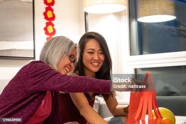 Preparing For Chinese New Year Celebrations Stock Photo - Download Image Now - Chinese New Year, Chinese Culture, Family