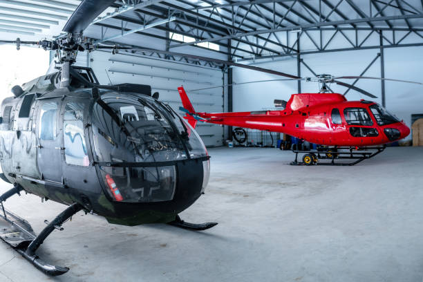 istock Two helicopters in hangar 1296639746