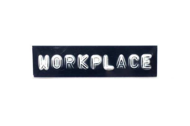 istock Embossed letter in word workplace on black banner with white background 1296642226